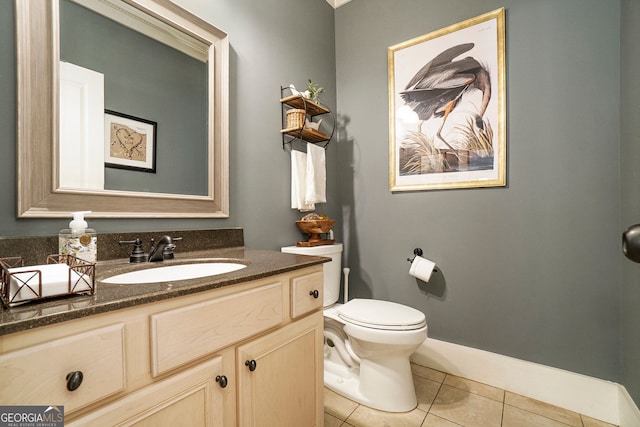 3227 Aviary Ct NW, Acworth, GA 30101 - bathroom featuring tile patterned flooring, vanity, toilet, and baseboards