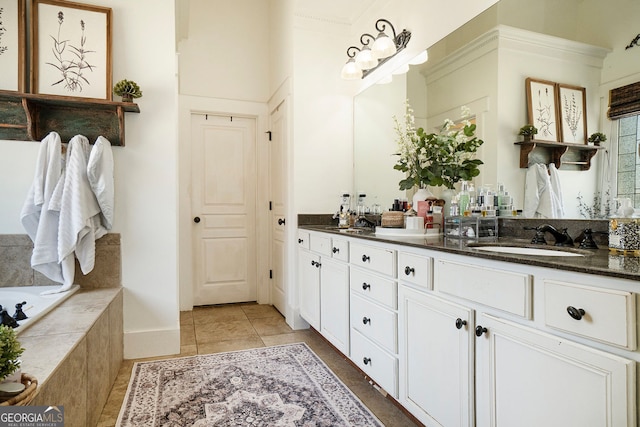 3227 Aviary Ct NW, Acworth, GA 30101 - bathroom featuring double vanity, tiled tub, and tile patterned floors