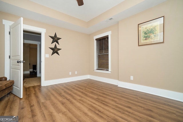 3227 Aviary Ct NW, Acworth, GA 30101 - unfurnished room with wood finished floors, baseboards, and a ceiling fan