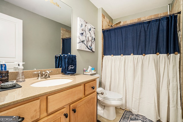 3227 Aviary Ct NW, Acworth, GA 30101 - full bathroom featuring vanity, toilet, tile patterned floors, and a shower with curtain