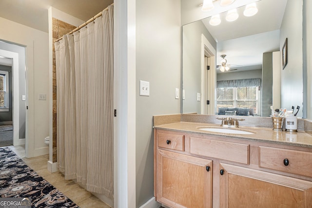 3227 Aviary Ct NW, Acworth, GA 30101 - bathroom featuring vanity, tile patterned flooring, ensuite bath, a ceiling fan, and a shower with curtain