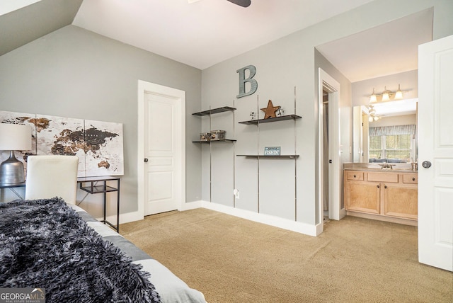 3227 Aviary Ct NW, Acworth, GA 30101 - bedroom with light colored carpet, a sink, baseboards, vaulted ceiling, and ensuite bathroom