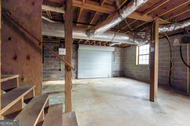 basement with concrete block wall