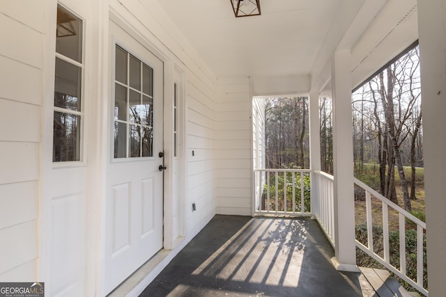 unfurnished sunroom featuring plenty of natural light