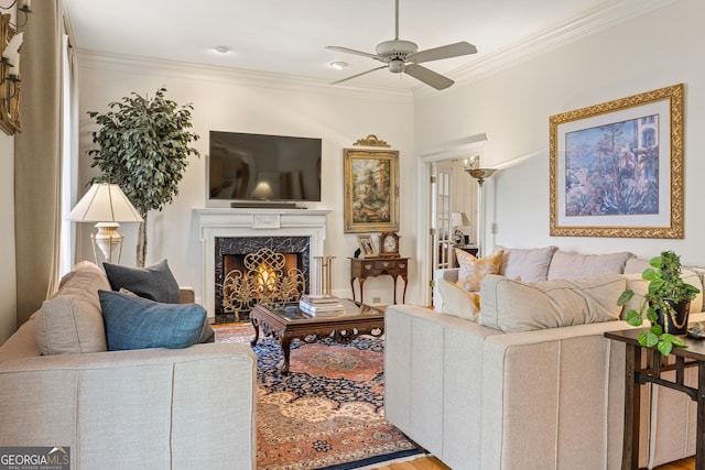 3847 Sweet Bottom Dr, Duluth, GA 30096 - living room featuring a ceiling fan, ornamental molding, a fireplace, and wood finished floors