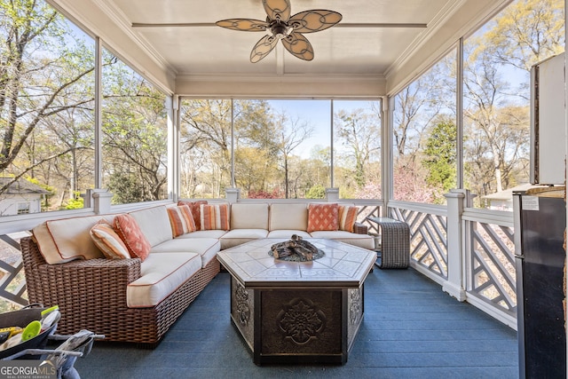 3847 Sweet Bottom Dr, Duluth, GA 30096 - sunroom / solarium with ceiling fan, an outdoor living space with a fire pit, and healthy amount of natural light
