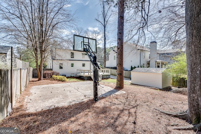 1861 Dyer Cir, Atlanta, GA 30341 - view of sport court featuring a shed and a fenced backyard