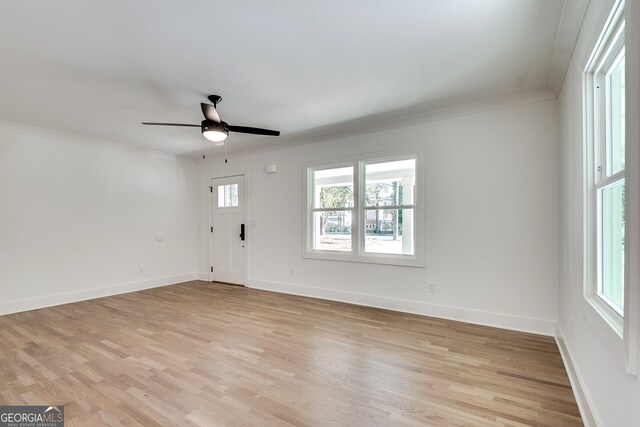 1861 Dyer Cir, Atlanta, GA 30341 - interior space with ornamental molding, a ceiling fan, light wood-style flooring, and baseboards