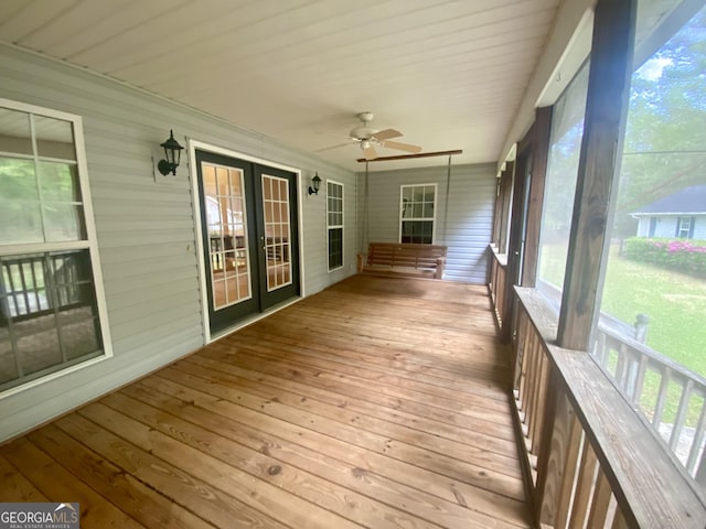 1311 Belmont Dr, Dublin, GA 31021 - unfurnished sunroom featuring ceiling fan and french doors