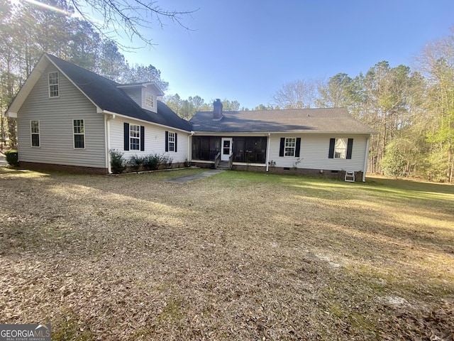 1311 Belmont Dr, Dublin, GA 31021 - back of house featuring a sunroom and a yard