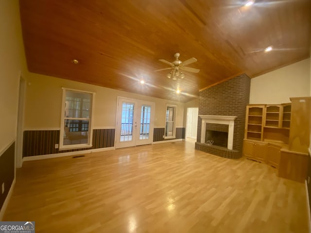 1311 Belmont Dr, Dublin, GA 31021 - unfurnished living room featuring lofted ceiling, wood finished floors, wood ceiling, and a ceiling fan