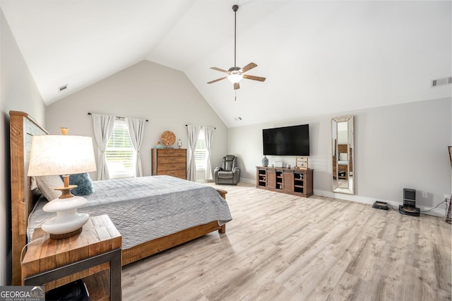 bedroom featuring high vaulted ceiling, baseboards, ceiling fan, visible vents, and wood finished floors