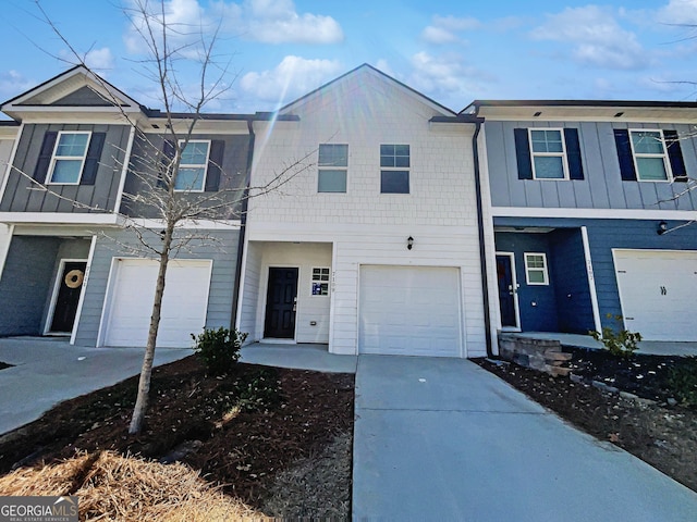 7109 Gladstone Cir, Lithonia, GA 30038 - multi unit property with a garage, driveway, and board and batten siding