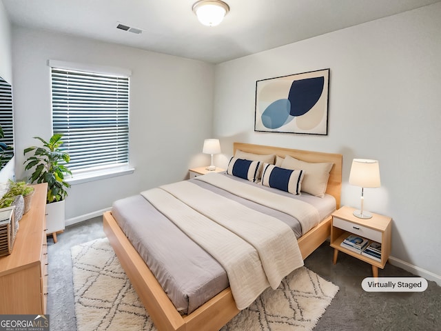 7109 Gladstone Cir, Lithonia, GA 30038 - carpeted bedroom with baseboards