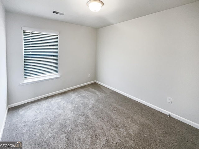 7109 Gladstone Cir, Lithonia, GA 30038 - carpeted empty room with baseboards