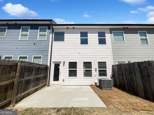 7109 Gladstone Cir, Lithonia, GA 30038 - back of property with a patio and a fenced backyard