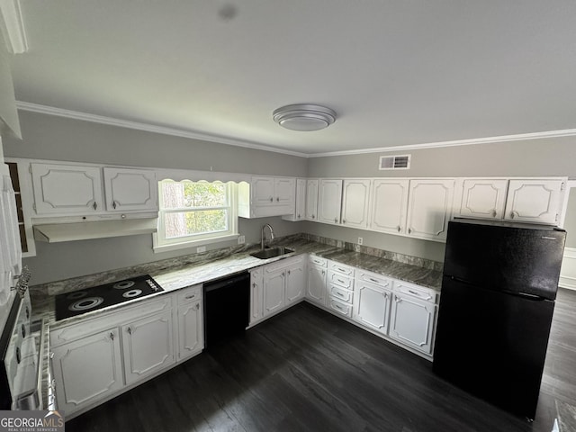 kitchen with white cabinets, visible vents, ornamental molding, a sink, and black appliances