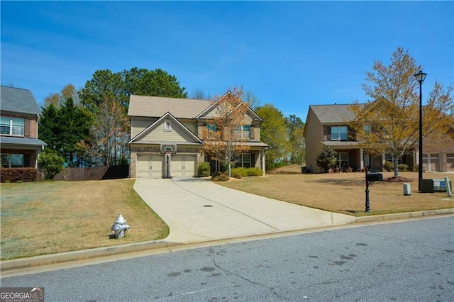 craftsman inspired home featuring concrete driveway, a front yard, and a garage