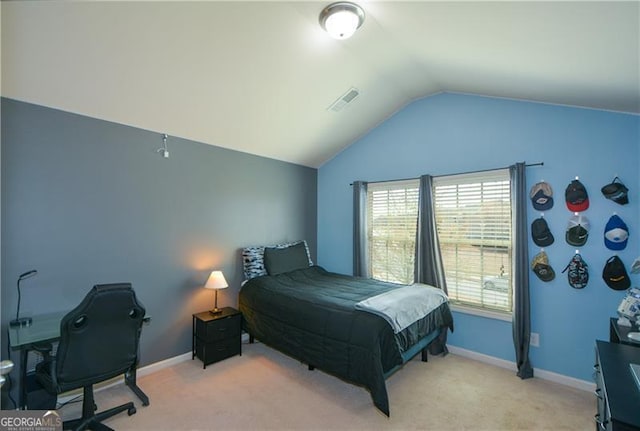 bedroom with light carpet, visible vents, baseboards, and lofted ceiling