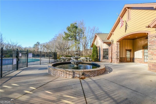 exterior space featuring a patio and fence