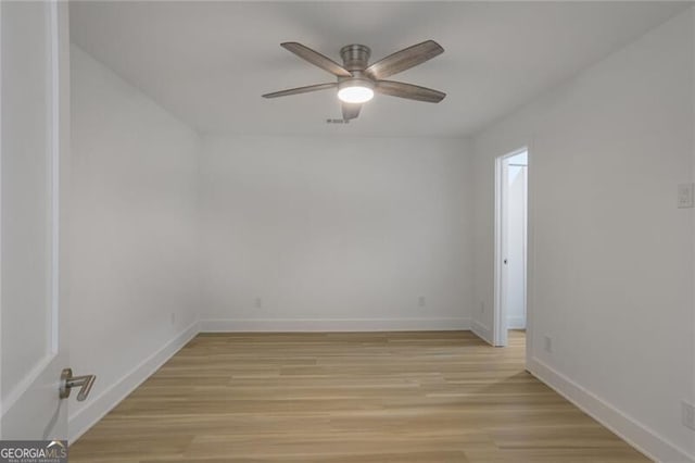2041 Briarcliff Rd NE, Atlanta, GA 30329 - empty room with a ceiling fan and light wood finished floors
