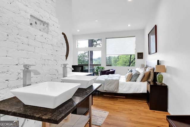 living area featuring recessed lighting and light wood-style flooring