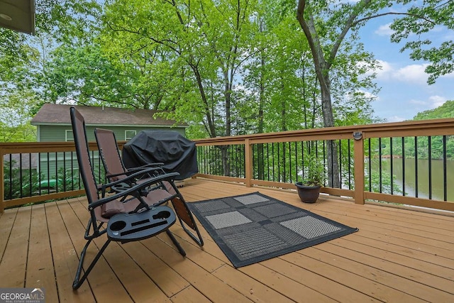 wooden terrace with grilling area