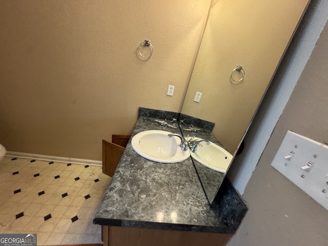 2863 Windsor Forrest Ct, Atlanta, GA 30349 - bathroom with vanity and baseboards