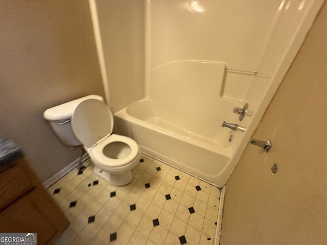 2863 Windsor Forrest Ct, Atlanta, GA 30349 - bathroom with bathtub / shower combination and tile patterned flooring