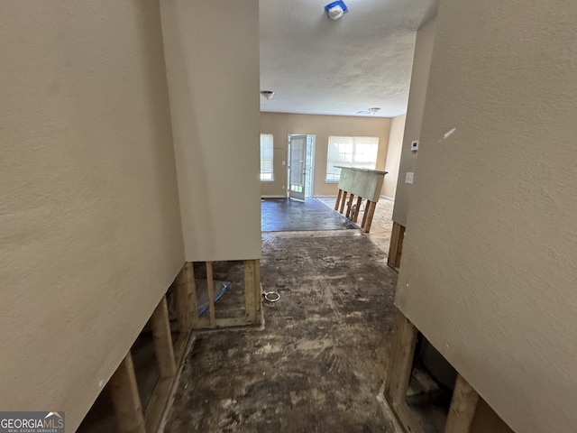 2863 Windsor Forrest Ct, Atlanta, GA 30349 - corridor with a textured wall