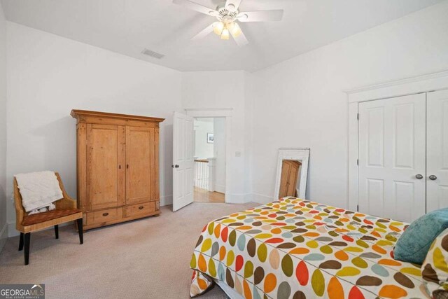 1181 Lanier Blvd NE, Atlanta, GA 30306 - bedroom with light colored carpet, a closet, and ceiling fan