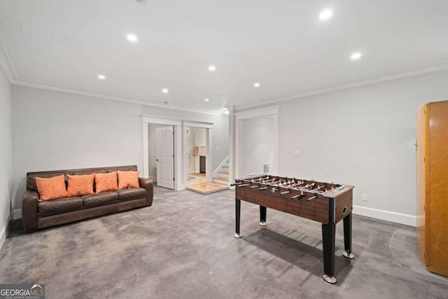 playroom with baseboards, ornamental molding, and recessed lighting