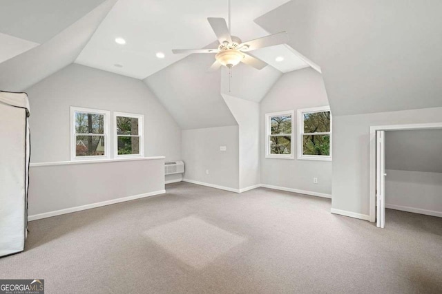 bonus room with carpet flooring, baseboards, lofted ceiling, and recessed lighting