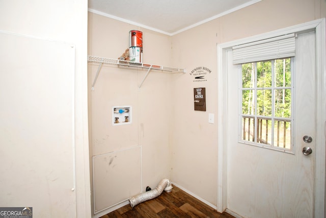 laundry room featuring crown molding, dark wood finished floors, baseboards, laundry area, and washer hookup
