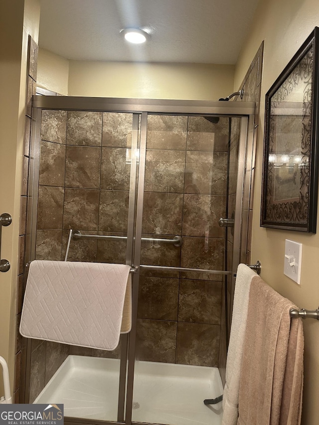 227 Fenwick Cir, Mcdonough, GA 30253 - bathroom featuring a shower stall