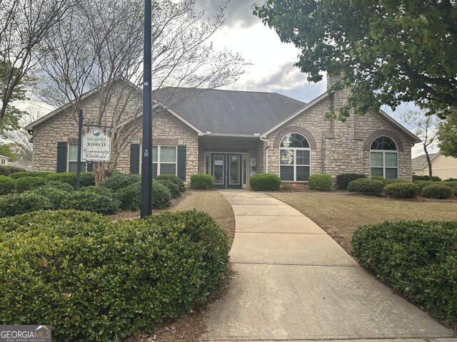 227 Fenwick Cir, Mcdonough, GA 30253 - view of front facade with stone siding and french doors