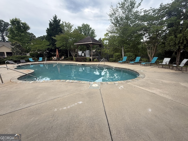 227 Fenwick Cir, Mcdonough, GA 30253 - community pool featuring a gazebo and a patio
