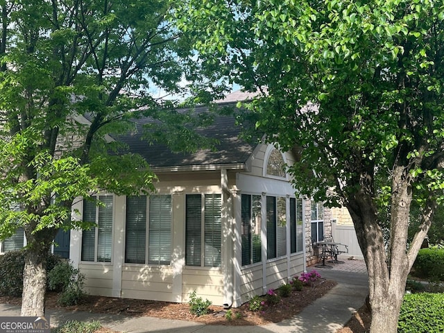 227 Fenwick Cir, Mcdonough, GA 30253 - view of property exterior featuring a sunroom