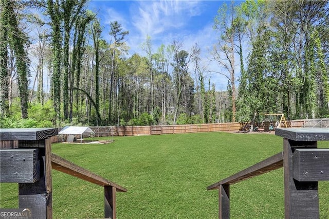 view of yard with fence