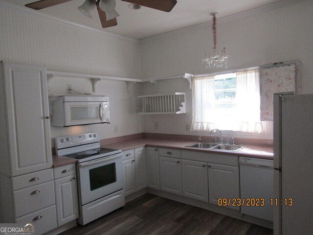 kitchen with open shelves, white appliances, dark wood-style flooring, ceiling fan with notable chandelier, and a sink