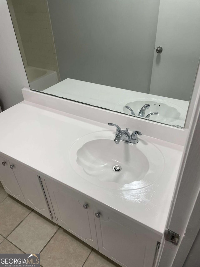 bathroom with tile patterned flooring, vanity, toilet, tub / shower combination, and visible vents