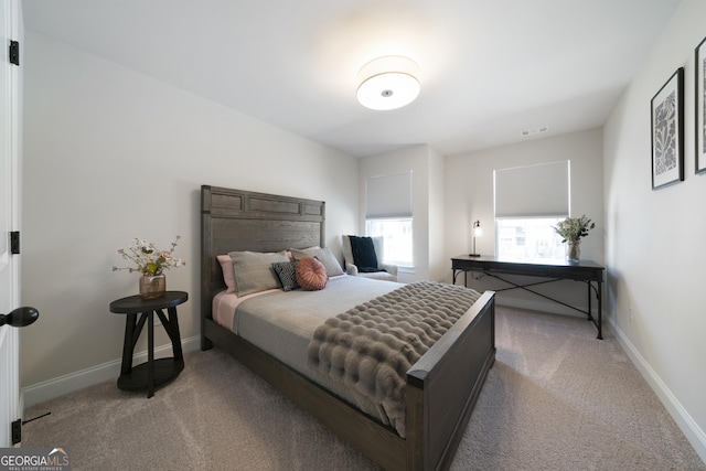 807 Stickley Oak Way, Woodstock, GA 30189 - bedroom with baseboards, visible vents, and light carpet