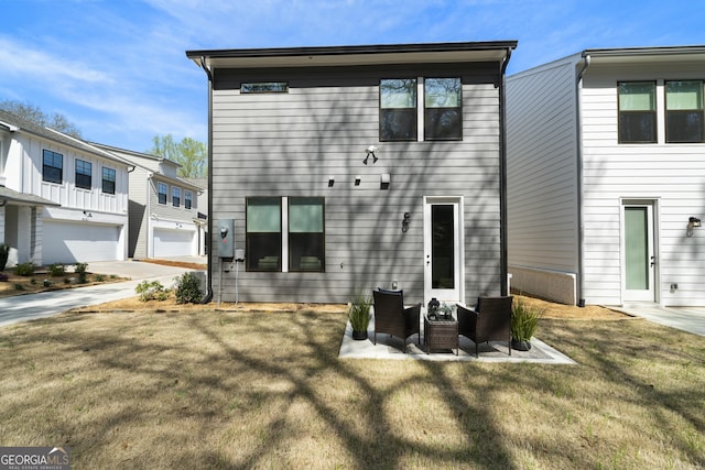807 Stickley Oak Way, Woodstock, GA 30189 - rear view of house featuring a lawn