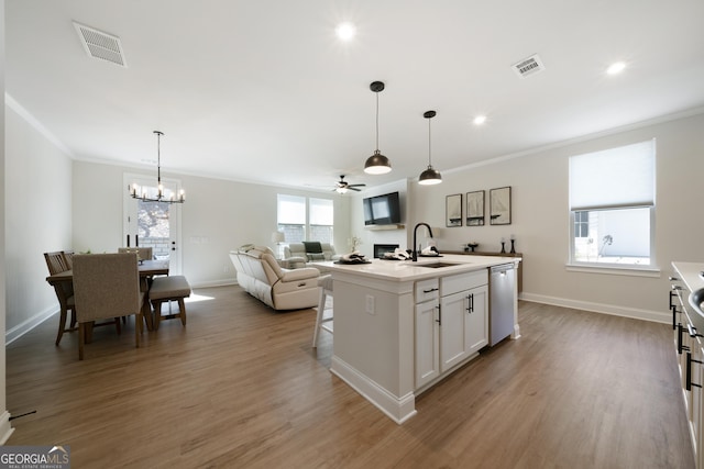 807 Stickley Oak Way, Woodstock, GA 30189 - kitchen with a sink, stainless steel dishwasher, crown molding, and visible vents