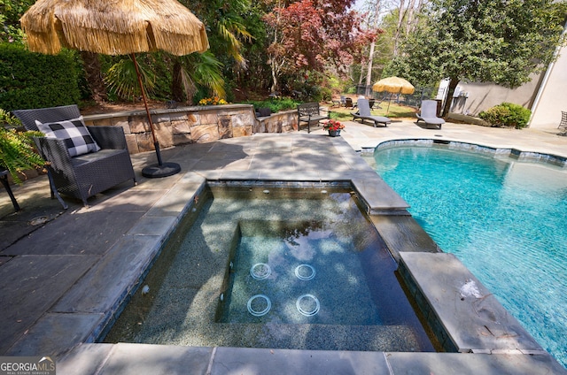 view of pool featuring a patio and a fenced in pool