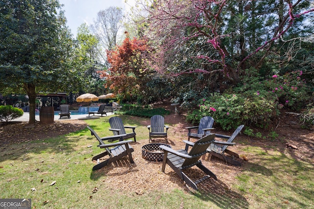 2005 Westbourne Way, Alpharetta, GA 30022 - view of green lawn featuring a fire pit and a pool