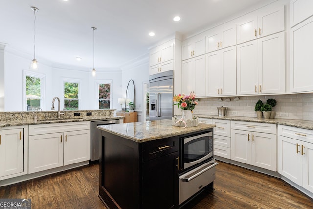 2005 Westbourne Way, Alpharetta, GA 30022 - kitchen featuring built in appliances, a sink, white cabinets, crown molding, and recessed lighting