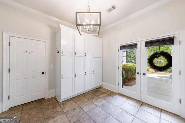 2005 Westbourne Way, Alpharetta, GA 30022 - foyer entrance featuring french doors, ornamental molding, a chandelier, and baseboards