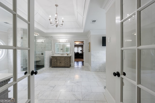 2005 Westbourne Way, Alpharetta, GA 30022 - bathroom with a chandelier, vanity, crown molding, tile walls, and french doors
