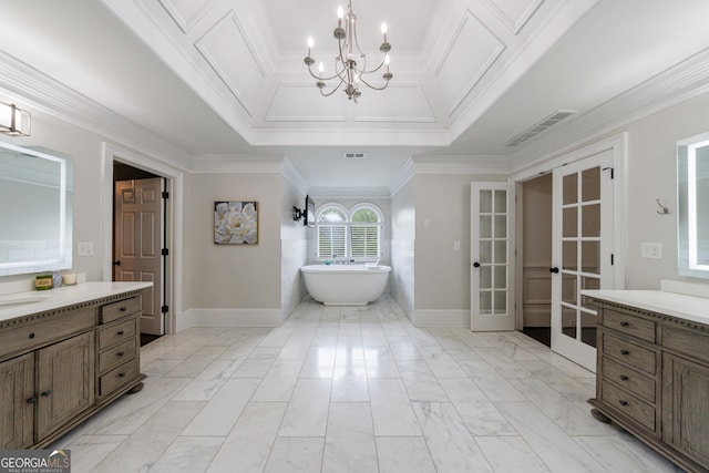 2005 Westbourne Way, Alpharetta, GA 30022 - full bathroom featuring french doors, a chandelier, vanity, a freestanding bath, and marble look tiles